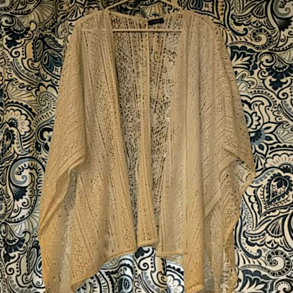 Lace, poncho-style jacket